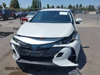 2021 Toyota Prius LE z VIN JTDKAMFP3M3187644, wystawiony jako IAAI lot #42443171 z przebiegiem 126 977 mil mil oraz . Historia ofert i sprzedaży dostępna na DreamBid. Obrazek 11.