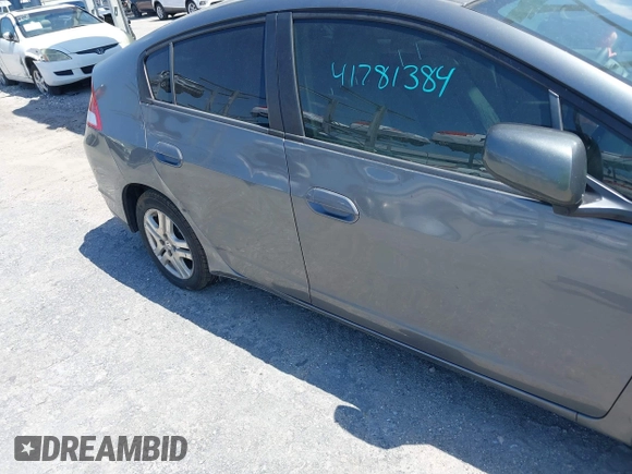 2012 Honda Insight LX with VIN JHMZE2H51CS003694, listed as a IAAI auction lot 41781384 with 154,685 mi miles and . Bid and sale history available at DreamBid. Image 17.