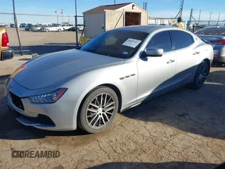 2015 Maserati Ghibli z VIN ZAM57XSA7F1135961, wystawiony jako IAAI lot #40831583 z przebiegiem 89 671 mil mil oraz . Historia ofert i sprzedaży dostępna na DreamBid. Obrazek 17.