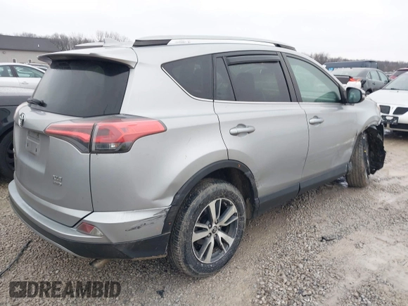 2018 Toyota RAV4 XLE with VIN 2T3RFREV1JW842728, listed as a IAAI auction lot 41519668 with 149,670 mi miles. Bid and sale history available at carsss.com. Image 4.