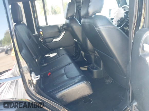 2017 Jeep Wrangler Unlimited Sahara with VIN 1C4BJWEG4HL637482, listed as a IAAI auction lot 41951349 with 76,030 mi miles. Bid and sale history available at carsss.com. Image 8.