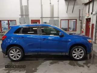 2015 Mitsubishi Outlander SE with VIN 4A4AR4AU1FE054804, listed as a IAAI auction lot 42325699 with 106,680 mi miles and . Bid and sale history available at DreamBid. Image 13.