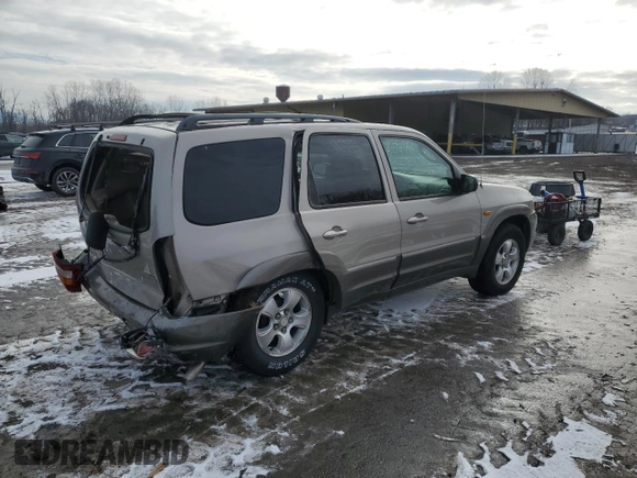 2001 Mazda Tribute LX with VIN 4F2CU081X1KM70119, listed as a Copart auction lot 89311935 with 176,851 mi miles and Salvage Title. Bid and sale history available at DreamBid. Image 3.