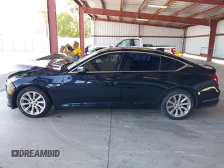 2020 Cadillac CT5 Luxury z VIN 1G6DM5RK2L0117741, wystawiony jako IAAI lot #42369222 z przebiegiem 206 105 mil mil oraz . Historia ofert i sprzedaży dostępna na DreamBid. Obrazek 14.