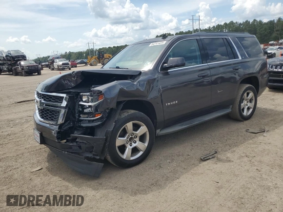 2015 Chevrolet Tahoe LT with VIN 1GNSCBKC1FR240186, listed as a Copart auction lot 64741425 with 110,357 mi miles and Salvage title. Bid and sale history available at DreamBid. Image 1.