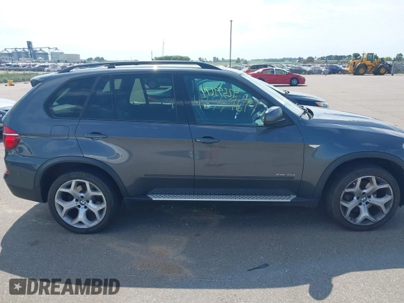 2012 BMW X5 35d with VIN 5UXZW0C56CL664575, listed as a IAAI auction lot 42559674 with 157,554 mi miles and . Bid and sale history available at DreamBid. Image 13.