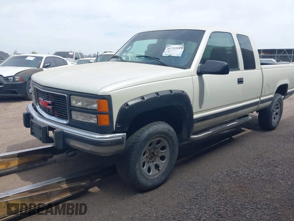 1995 GMC Sierra 1500 z VIN 2GTEK19K9S1591415, wystawiony jako IAAI lot #41793889 z przebiegiem 334 435 mil mil oraz . Historia ofert i sprzedaży dostępna na DreamBid. Obrazek 2.