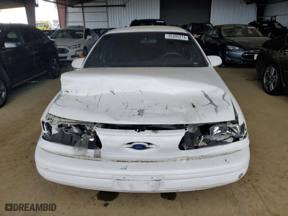 1994 Ford Taurus GL with VIN 1FALP52U5RA259098, listed as a Copart auction lot 85495274 with 83,616 mi miles and Salvage Title. Bid and sale history available at carsss.com. Image 5.