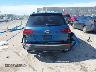 2018 Volkswagen Tiguan SEL z VIN 3VV3B7AX2JM155306, wystawiony jako IAAI lot #42457735 z przebiegiem 48 061 mil mil oraz . Historia ofert i sprzedaży dostępna na DreamBid. Obrazek 16.