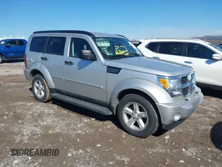 2007 Dodge Nitro SLT with VIN 1D8GT58K77W614092, listed as a IAAI auction lot 41645991 with 129,931 mi miles. Bid and sale history available at carsss.com. Image 1.