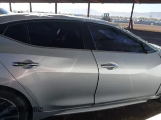 2019 Nissan Maxima Platinum z VIN 1N4AA6AV6KC363764, wystawiony jako IAAI lot #41506203 z przebiegiem 92 415 mil mil oraz . Historia ofert i sprzedaży dostępna na DreamBid. Obrazek 14.