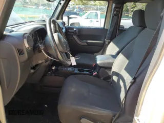 2017 Jeep Wrangler Unlimited Sport with VIN 1C4BJWDG7HL683406, listed as a Copart auction lot 62758735 with 75,140 mi miles and Salvage title. Bid and sale history available at DreamBid. Image 7.