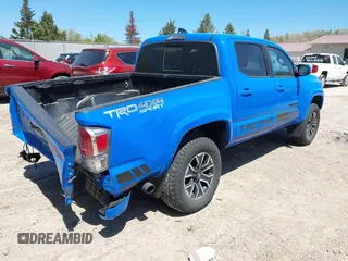 2020 Toyota Tacoma SR5 z VIN 3TMCZ5AN5LM337632, wystawiony jako IAAI lot #42203628 z przebiegiem 39 831 mil mil oraz . Historia ofert i sprzedaży dostępna na DreamBid. Obrazek 4.