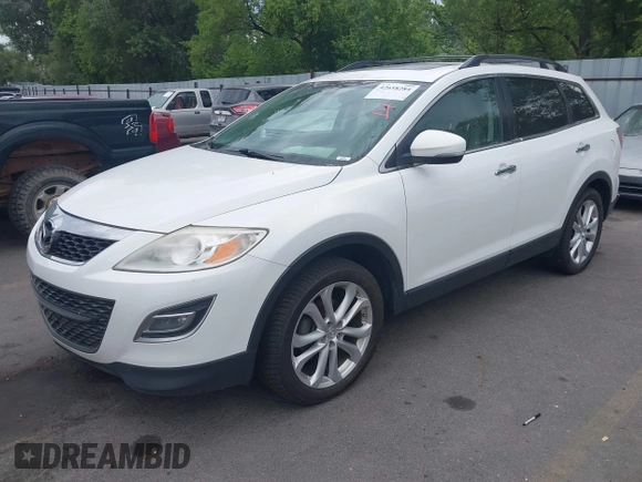 2012 Mazda CX-9 Grand Touring with VIN JM3TB3DA1C0356335, listed as a IAAI auction lot 42658284 with 141,537 mi miles and . Bid and sale history available at DreamBid. Image 2.