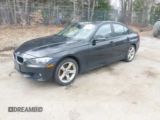 2013 BMW 3 Series 328i xDrive with VIN WBA3B5C5XDF597184, listed as a IAAI auction lot 42060785 with 205,559 mi miles. Bid and sale history available at carsss.com. Image 2.