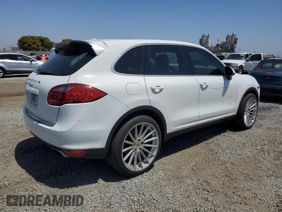 2014 Porsche Cayenne with VIN WP1AA2A28ELA09742, listed as a Copart auction lot 61779285 with 182,380 mi miles and Salvage title. Bid and sale history available at DreamBid. Image 3.