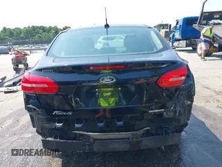 2016 Ford Focus S z VIN 1FADP3E26GL393235, wystawiony jako IAAI lot #42385660 z przebiegiem 133 049 mil mil oraz . Historia ofert i sprzedaży dostępna na DreamBid. Obrazek 17.