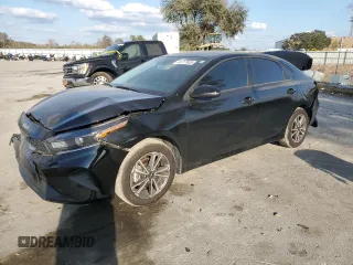 2024 Kia Forte LXS with VIN 3KPF24AD7RE825955, listed as a Copart auction lot 44717805 with 11,857 mi miles and Non Repairable. Bid and sale history available at carsss.com. Image 1.