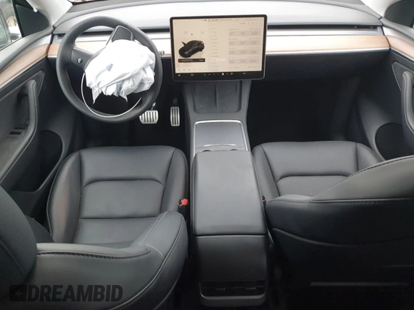 2023 Tesla Model Y Performance with VIN 7SAYGDEF3PF847225, listed as a Copart auction lot 52171135 with 29,724 mi miles and Salvage Title. Bid and sale history available at DreamBid. Image 8.