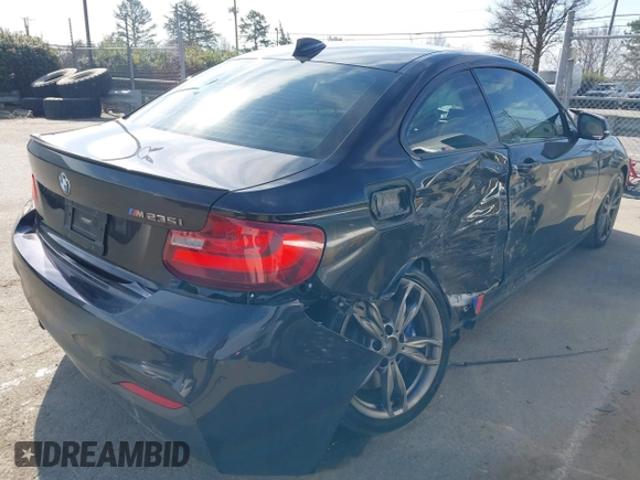 2015 BMW 2 Series M235i with VIN WBA1J7C55FV358964, listed as a IAAI auction lot 41674800 with 63,504 mi miles and . Bid and sale history available at carsss.com. Image 4.