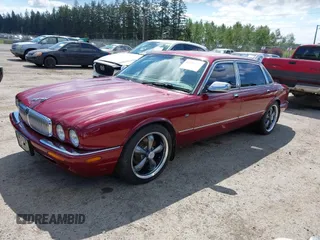 1998 Jaguar XJ Vanden Plas with VIN SAJKX6249WC844067, listed as a IAAI auction lot 42145235 with 117,142 mi miles and . Bid and sale history available at DreamBid. Image 2.