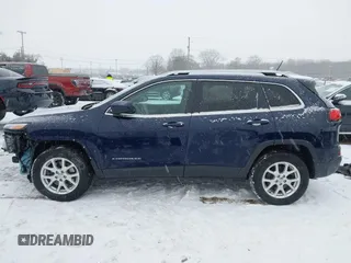 2014 Jeep Cherokee Altitude with VIN 1C4PJMCB9EW187288, listed as a IAAI auction lot 41320161 with 169,534 mi miles and . Bid and sale history available at DreamBid. Image 15.