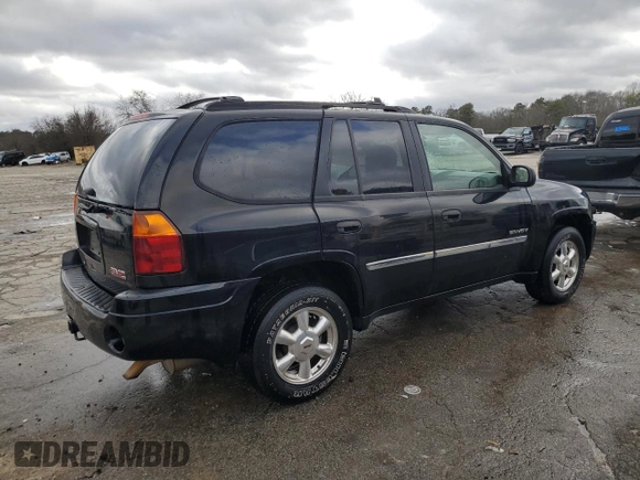 2006 GMC Envoy SLT with VIN 1GKDS13S762258032, listed as a Copart auction lot 88677095 with 184,188 mi miles and Salvage Title. Bid and sale history available at carsss.com. Image 3.