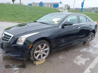 2014 Cadillac ATS Luxury AWD z VIN 1G6AH5SX0E0196052, wystawiony jako IAAI lot #41995886 z przebiegiem 97 531 mil mil oraz . Historia ofert i sprzedaży dostępna na DreamBid. Obrazek 2.