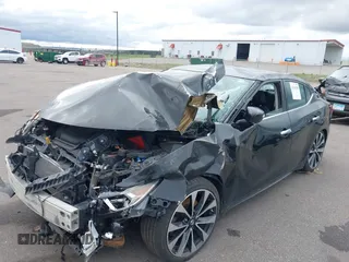 2016 Nissan Maxima SR z VIN 1N4AA6AP9GC386237, wystawiony jako IAAI lot #42166280 z przebiegiem 130 091 mil mil oraz . Historia ofert i sprzedaży dostępna na DreamBid. Obrazek 18.