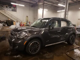 2015 MINI Cooper Countryman S with VIN WMWZC5C51FWM18945, listed as a Copart auction lot 45018755 with 135,086 mi miles and Salvage Title. Bid and sale history available at carsss.com. Image 1.