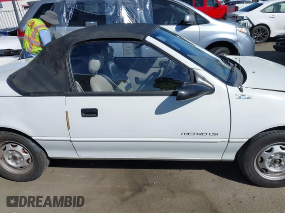 1992 Geo Metro z VIN JG1MR3364NK213871, wystawiony jako IAAI lot #41719350 z przebiegiem 22 589 mil mil oraz . Historia ofert i sprzedaży dostępna na DreamBid. Obrazek 13.