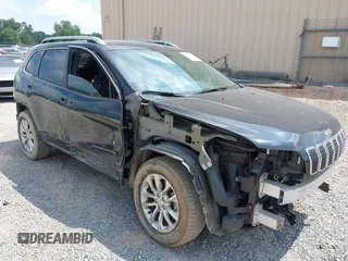 2019 Jeep Cherokee Latitude with VIN 1C4PJMCX7KD102709, listed as a IAAI auction lot 42626211 with 52,979 mi miles and . Bid and sale history available at DreamBid. Image 1.