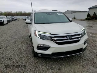 2017 Honda Pilot Elite with VIN 5FNYF6H04HB056917, listed as a Copart auction lot 51770735 with 88,762 mi miles and Salvage Title. Bid and sale history available at DreamBid. Image 14.