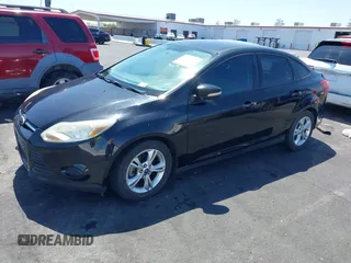 2013 Ford Focus SE with VIN 1FADP3F21DL264359, listed as a IAAI auction lot 42562576 with 167,624 mi miles and . Bid and sale history available at DreamBid. Image 2.