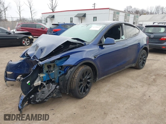 2025 Tesla Model Y Long Range with VIN 7SAYGDED9SF248370, listed as a IAAI auction lot 41336869 with 2,499 mi miles and . Bid and sale history available at DreamBid. Image 18.