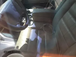 1995 Cadillac DeVille z VIN 1G6KD52B5SU263656, wystawiony jako Copart lot #83631284 z przebiegiem Nie podano mil oraz Szkoda całkowita • Salvage title. Historia ofert i sprzedaży dostępna na DreamBid. Obrazek 7.