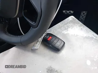 2025 Toyota Camry LE z VIN 4T1DAACK3SU571104, wystawiony jako IAAI lot #42084430 z przebiegiem 1 013 mil mil oraz . Historia ofert i sprzedaży dostępna na DreamBid. Obrazek 11.