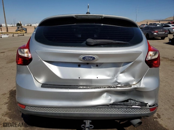 2014 Ford Focus SE with VIN 1FADP3K22EL169090, listed as a Copart auction lot 74069884 with 101,881 mi miles and Salvage Title. Bid and sale history available at carsss.com. Image 6.