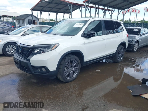 2021 Honda Passport EX-L with VIN 5FNYF8H54MB041738, listed as a IAAI auction lot 42310470 with 52,409 mi miles and . Bid and sale history available at DreamBid. Image 18.