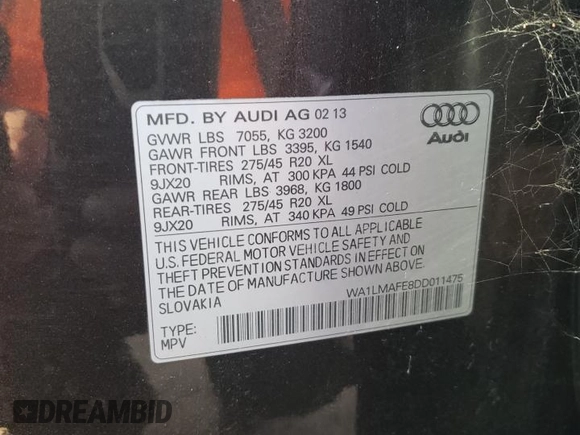 2013 Audi Q7 Premium Plus with VIN WA1LMAFE8DD011475, listed as a Copart auction lot 64720144 with 125,632 mi miles and Salvage title. Bid and sale history available at DreamBid. Image 12.