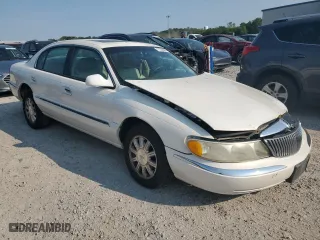 2001 Lincoln Continental with VIN 1LNHM97V91Y659769, listed as a Copart auction lot 71220804 with 0 mi miles and Salvage Title. Bid and sale history available at carsss.com. Image 4.