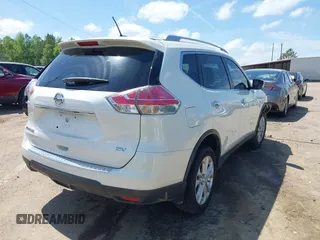 2016 Nissan Rogue SV with VIN KNMAT2MT2GP633600, listed as a IAAI auction lot 39191100 with 128,051 mi miles and . Bid and sale history available at DreamBid. Image 4.