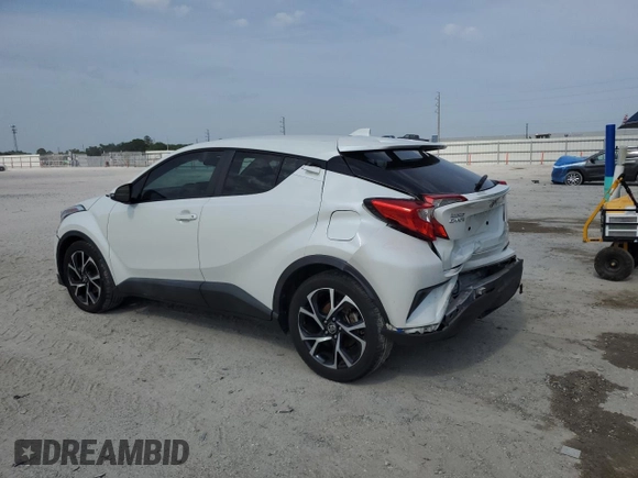 2019 Toyota C-HR XLE z VIN NMTKHMBX5KR079425, wystawiony jako Copart lot #57315345 z przebiegiem 109 441 mil mil oraz Szkoda całkowita • Salvage title. Historia ofert i sprzedaży dostępna na DreamBid. Obrazek 2.