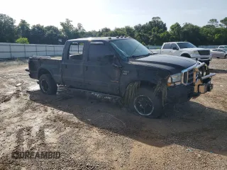 2003 Ford Super Duty F-250 XL with VIN 1FTNW21P73EC67848, listed as a Copart auction lot 64401394 with 146,307 mi miles and Salvage Title. Bid and sale history available at carsss.com. Image 4.