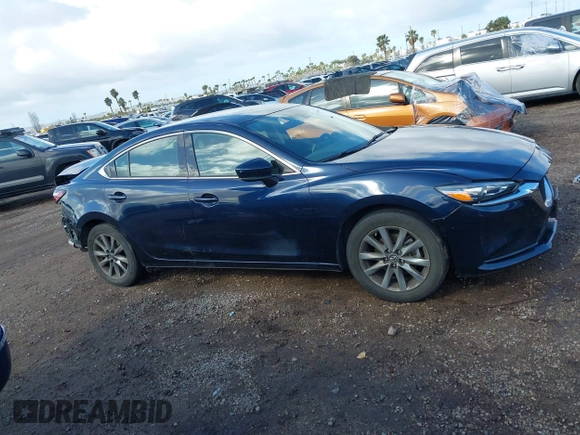 2020 Mazda 6 Sport with VIN JM1GL1UM5L1519519, listed as a IAAI auction lot 41920571 with 59,378 mi miles and . Bid and sale history available at DreamBid. Image 14.