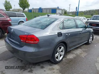 2013 Volkswagen Passat SE with VIN 1VWBH7A31DC084351, listed as a IAAI auction lot 42014167 with 187,959 mi miles and . Bid and sale history available at DreamBid. Image 4.
