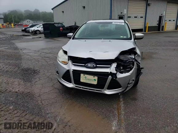 2012 Ford Focus SE z VIN 1FAHP3K25CL246694, wystawiony jako Copart lot #59591645 z przebiegiem 222 330 mil mil oraz Szkoda całkowita • Salvage title. Historia ofert i sprzedaży dostępna na DreamBid. Obrazek 13.