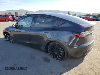 2025 Tesla Model Y Long Range with VIN 7SAYGDEE4SF272942, listed as a Copart auction lot 45817885 with 2,308 mi miles and Salvage Title. Bid and sale history available at DreamBid. Image 2.