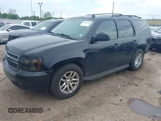 2007 Chevrolet Tahoe LTZ z VIN 1GNFK13047J377917, wystawiony jako IAAI lot #41910308 z przebiegiem 178 854 mil mil oraz . Historia ofert i sprzedaży dostępna na DreamBid. Obrazek 17.