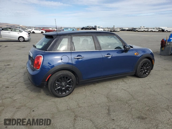 2015 MINI Hardtop 4 Door z VIN WMWXS5C5XFT831166, wystawiony jako Copart lot #78248204 z przebiegiem 69 459 mil mil oraz Szkoda całkowita • Salvage title. Historia ofert i sprzedaży dostępna na DreamBid. Obrazek 3.